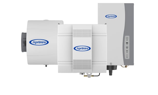 Three Aprilaire humidifier models displayed side by side on a white background