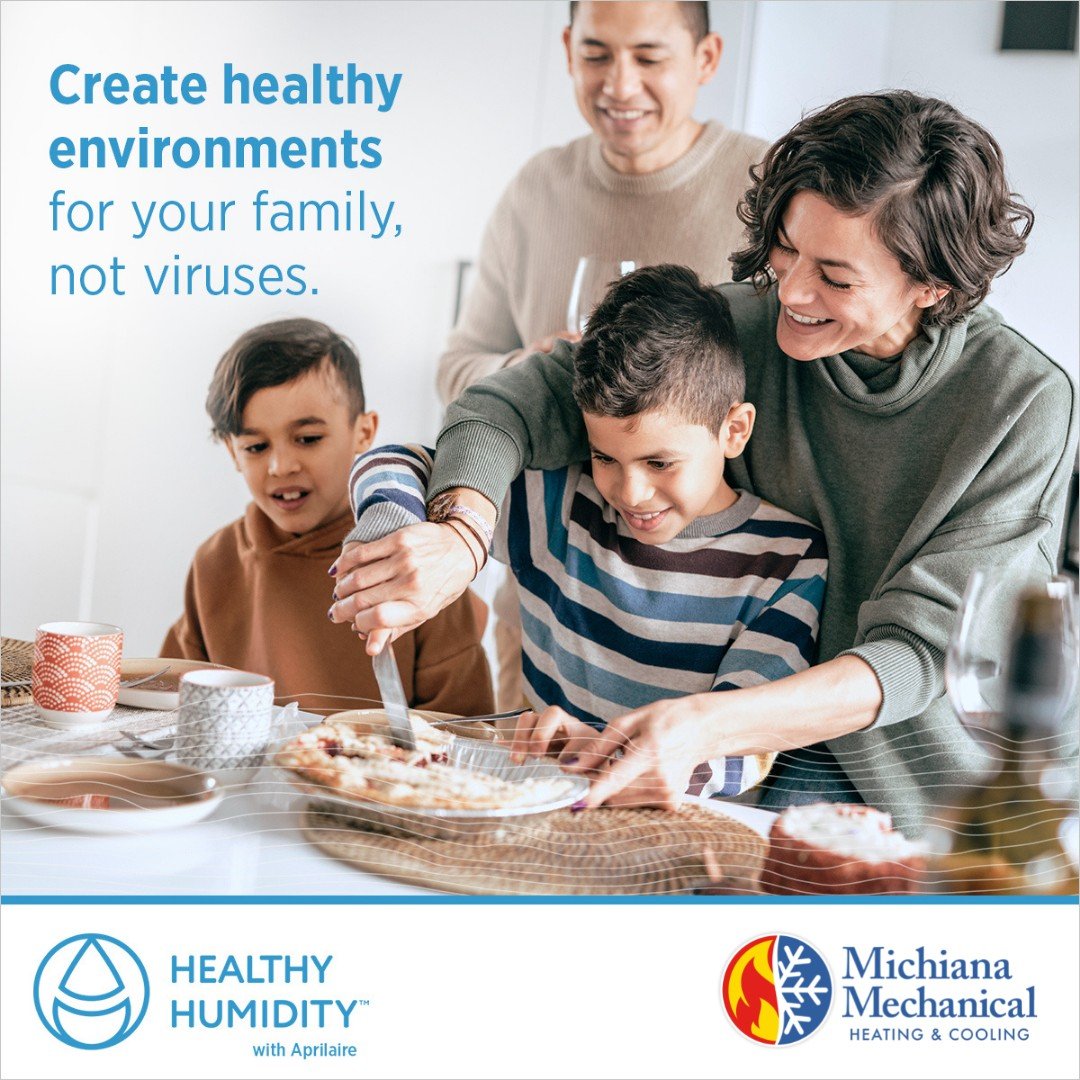Family smiling and baking together at home with “Create healthy environments for your family, not viruses” message from Michiana Mechanical